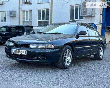 Зеленый Мицубиси Галант, объемом двигателя 1.8 л и пробегом 455 тыс. км за 1999 $, фото 1 на Automoto.ua