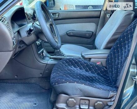 Зеленый Мицубиси Галант, объемом двигателя 1.8 л и пробегом 455 тыс. км за 1999 $, фото 13 на Automoto.ua