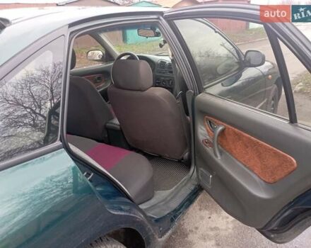 Зеленый Мицубиси Галант, объемом двигателя 1.83 л и пробегом 200 тыс. км за 3100 $, фото 13 на Automoto.ua