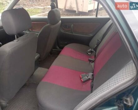 Зеленый Мицубиси Галант, объемом двигателя 1.83 л и пробегом 200 тыс. км за 3100 $, фото 9 на Automoto.ua