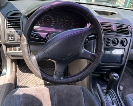 Зеленый Мицубиси Галант, объемом двигателя 2 л и пробегом 214 тыс. км за 2500 $, фото 17 на Automoto.ua