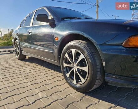 Зеленый Мицубиси Галант, объемом двигателя 2 л и пробегом 384 тыс. км за 3000 $, фото 2 на Automoto.ua