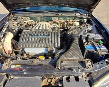 Зеленый Мицубиси Галант, объемом двигателя 2.5 л и пробегом 300 тыс. км за 3100 $, фото 12 на Automoto.ua