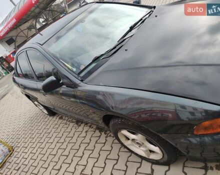 Зеленый Мицубиси Галант, объемом двигателя 2 л и пробегом 300 тыс. км за 2650 $, фото 2 на Automoto.ua