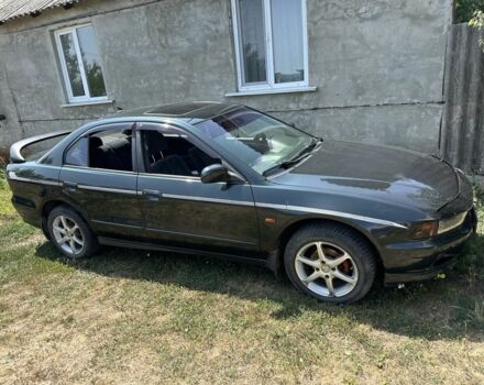 Зеленый Мицубиси Галант, объемом двигателя 2 л и пробегом 214 тыс. км за 2500 $, фото 2 на Automoto.ua