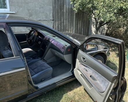 Зеленый Мицубиси Галант, объемом двигателя 2 л и пробегом 214 тыс. км за 2500 $, фото 12 на Automoto.ua