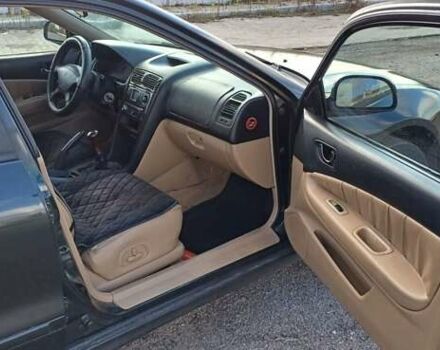 Зеленый Мицубиси Галант, объемом двигателя 2.5 л и пробегом 300 тыс. км за 3100 $, фото 6 на Automoto.ua