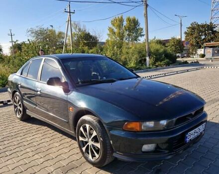 Зеленый Мицубиси Галант, объемом двигателя 2 л и пробегом 384 тыс. км за 3000 $, фото 1 на Automoto.ua