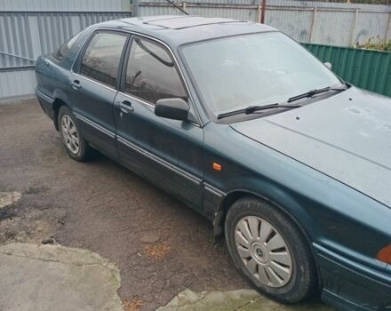 Зелений Міцубісі Галант, об'ємом двигуна 2 л та пробігом 300 тис. км за 1800 $, фото 1 на Automoto.ua