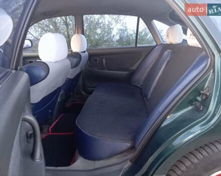 Зеленый Мицубиси Галант, объемом двигателя 2 л и пробегом 325 тыс. км за 2400 $, фото 20 на Automoto.ua