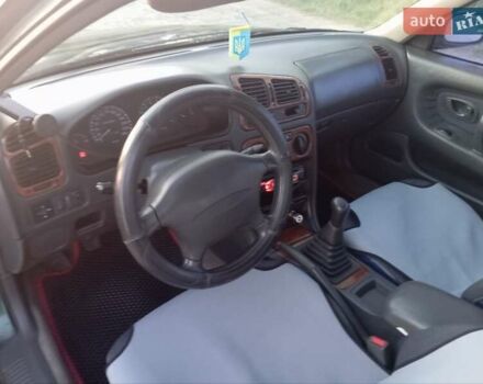 Зеленый Мицубиси Галант, объемом двигателя 2 л и пробегом 325 тыс. км за 2400 $, фото 1 на Automoto.ua