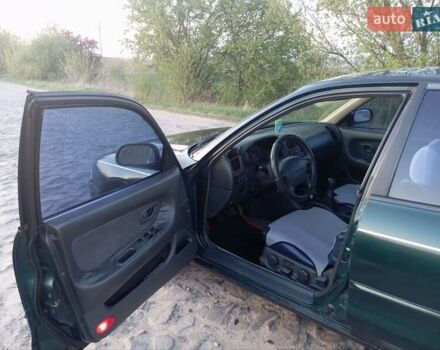 Зеленый Мицубиси Галант, объемом двигателя 2 л и пробегом 325 тыс. км за 2400 $, фото 6 на Automoto.ua