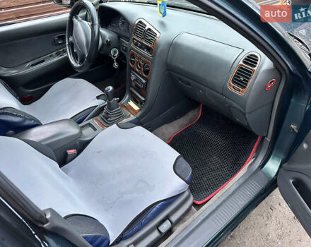 Зеленый Мицубиси Галант, объемом двигателя 2 л и пробегом 412 тыс. км за 1999 $, фото 3 на Automoto.ua