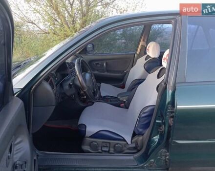 Зеленый Мицубиси Галант, объемом двигателя 2 л и пробегом 325 тыс. км за 2400 $, фото 3 на Automoto.ua