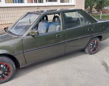 Зелений Міцубісі Галант, об'ємом двигуна 2 л та пробігом 285 тис. км за 1100 $, фото 1 на Automoto.ua