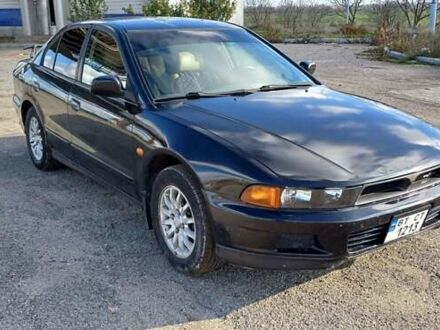 Зеленый Мицубиси Галант, объемом двигателя 2.5 л и пробегом 300 тыс. км за 3100 $, фото 1 на Automoto.ua