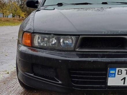 Зеленый Мицубиси Галант, объемом двигателя 2.5 л и пробегом 300 тыс. км за 3100 $, фото 1 на Automoto.ua