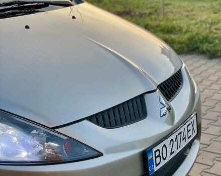 Бежевый Мицубиси Грандис, объемом двигателя 2.38 л и пробегом 74 тыс. км за 7200 $, фото 11 на Automoto.ua