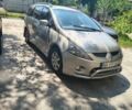 Бежевий Міцубісі Грандіс, об'ємом двигуна 2.38 л та пробігом 403 тис. км за 4200 $, фото 1 на Automoto.ua