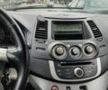 Бежевый Мицубиси Грандис, объемом двигателя 2.4 л и пробегом 399 тыс. км за 6000 $, фото 1 на Automoto.ua