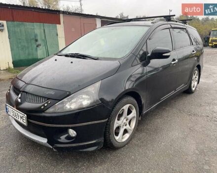 Черный Мицубиси Грандис, объемом двигателя 2.4 л и пробегом 311 тыс. км за 5350 $, фото 1 на Automoto.ua