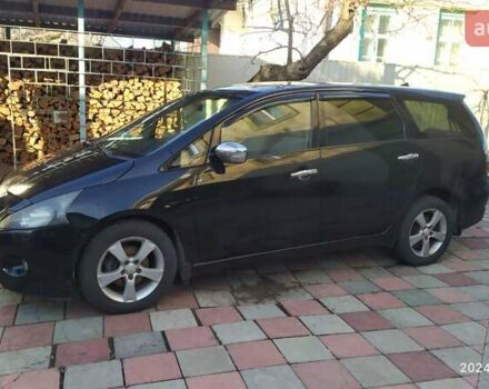 Черный Мицубиси Грандис, объемом двигателя 2.4 л и пробегом 282 тыс. км за 5400 $, фото 9 на Automoto.ua