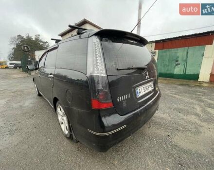 Черный Мицубиси Грандис, объемом двигателя 2.4 л и пробегом 311 тыс. км за 5350 $, фото 2 на Automoto.ua