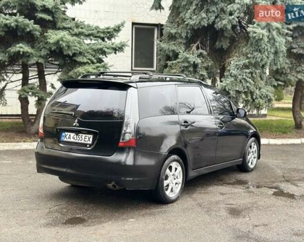 Черный Мицубиси Грандис, объемом двигателя 2.4 л и пробегом 290 тыс. км за 4650 $, фото 4 на Automoto.ua