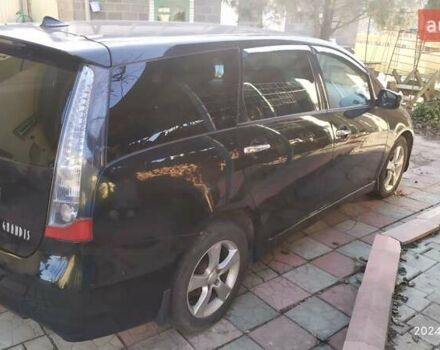 Черный Мицубиси Грандис, объемом двигателя 2.4 л и пробегом 282 тыс. км за 5400 $, фото 1 на Automoto.ua