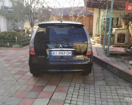 Черный Мицубиси Грандис, объемом двигателя 2.4 л и пробегом 282 тыс. км за 5400 $, фото 2 на Automoto.ua