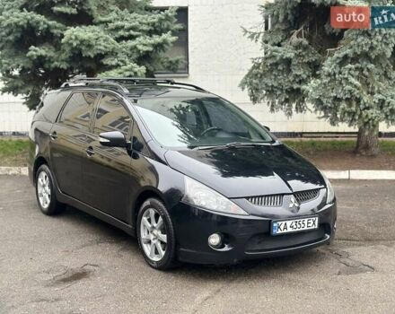 Черный Мицубиси Грандис, объемом двигателя 2.4 л и пробегом 290 тыс. км за 4650 $, фото 1 на Automoto.ua