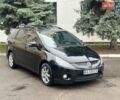 Черный Мицубиси Грандис, объемом двигателя 2.4 л и пробегом 290 тыс. км за 4650 $, фото 1 на Automoto.ua