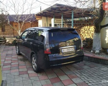 Черный Мицубиси Грандис, объемом двигателя 2.4 л и пробегом 282 тыс. км за 5400 $, фото 3 на Automoto.ua