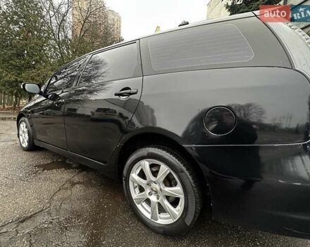 Черный Мицубиси Грандис, объемом двигателя 2.4 л и пробегом 290 тыс. км за 4650 $, фото 10 на Automoto.ua