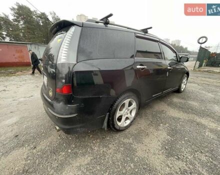 Черный Мицубиси Грандис, объемом двигателя 2.4 л и пробегом 311 тыс. км за 5350 $, фото 4 на Automoto.ua