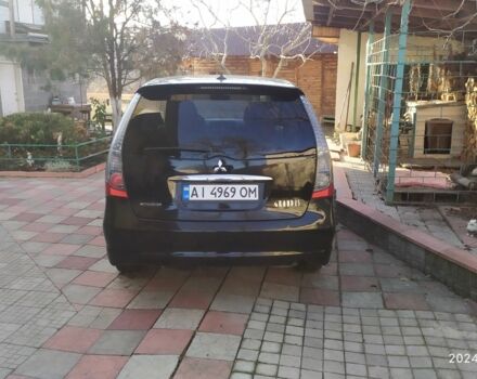Чорний Міцубісі Грандіс, об'ємом двигуна 2.4 л та пробігом 282 тис. км за 4700 $, фото 4 на Automoto.ua