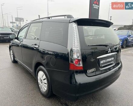 Черный Мицубиси Грандис, объемом двигателя 2.4 л и пробегом 212 тыс. км за 5300 $, фото 4 на Automoto.ua