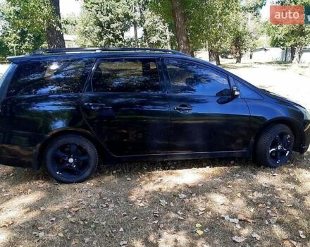 Черный Мицубиси Грандис, объемом двигателя 2.4 л и пробегом 326 тыс. км за 5500 $, фото 5 на Automoto.ua