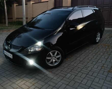 Черный Мицубиси Грандис, объемом двигателя 2.4 л и пробегом 270 тыс. км за 6000 $, фото 2 на Automoto.ua