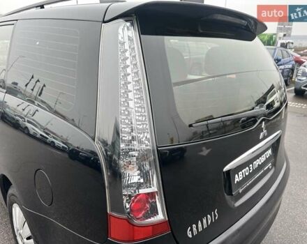 Черный Мицубиси Грандис, объемом двигателя 2.4 л и пробегом 212 тыс. км за 5300 $, фото 11 на Automoto.ua