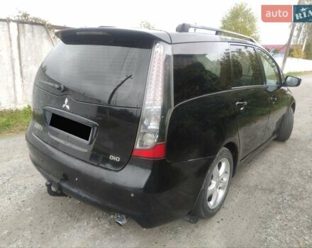 Черный Мицубиси Грандис, объемом двигателя 2 л и пробегом 309 тыс. км за 5400 $, фото 3 на Automoto.ua