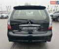 Черный Мицубиси Грандис, объемом двигателя 2.4 л и пробегом 212 тыс. км за 5300 $, фото 5 на Automoto.ua