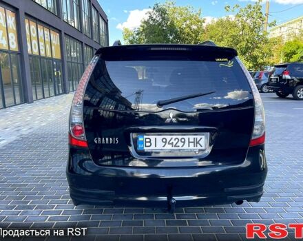 Черный Мицубиси Грандис, объемом двигателя 2.4 л и пробегом 250 тыс. км за 5900 $, фото 3 на Automoto.ua