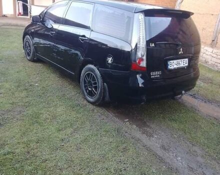 Черный Мицубиси Грандис, объемом двигателя 2.38 л и пробегом 222 тыс. км за 5800 $, фото 1 на Automoto.ua