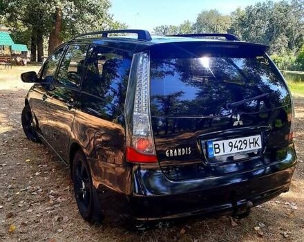 Черный Мицубиси Грандис, объемом двигателя 2.4 л и пробегом 326 тыс. км за 5500 $, фото 2 на Automoto.ua