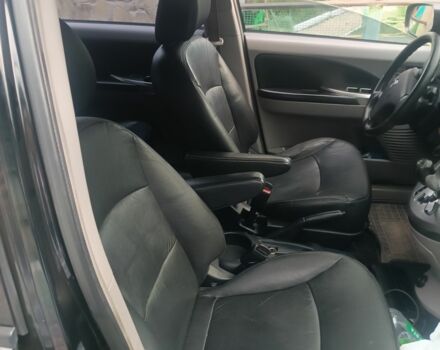 Черный Мицубиси Грандис, объемом двигателя 2.4 л и пробегом 270 тыс. км за 6000 $, фото 3 на Automoto.ua