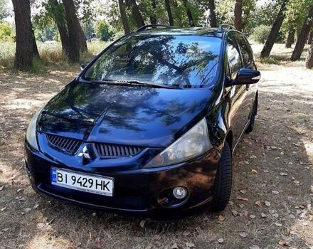 Черный Мицубиси Грандис, объемом двигателя 2.4 л и пробегом 326 тыс. км за 5500 $, фото 1 на Automoto.ua