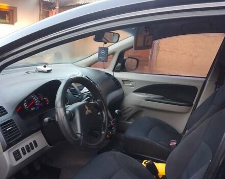 Черный Мицубиси Грандис, объемом двигателя 2.38 л и пробегом 222 тыс. км за 5800 $, фото 5 на Automoto.ua