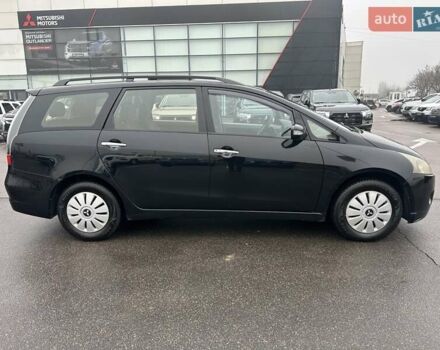 Черный Мицубиси Грандис, объемом двигателя 2.4 л и пробегом 212 тыс. км за 5300 $, фото 7 на Automoto.ua