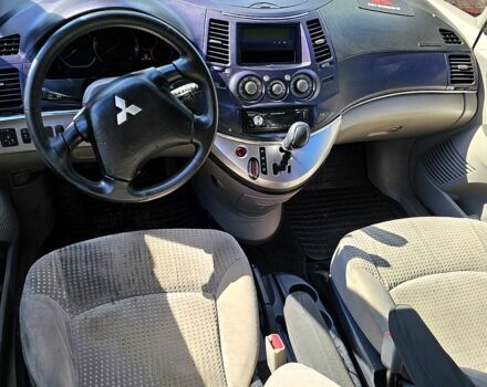 Черный Мицубиси Грандис, объемом двигателя 2.4 л и пробегом 242 тыс. км за 3900 $, фото 1 на Automoto.ua